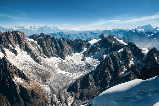Beautiful landscape aerial view from helicopter of Talefre glacier and Chamonix needles from Mont Blanc massif in french Alps mountains during a sunny autumn day.
