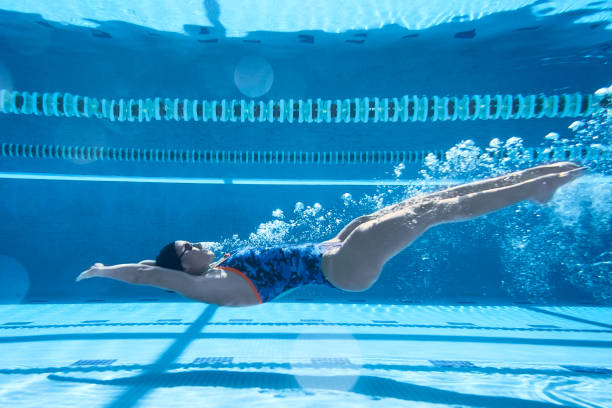 istock Adaptive Athlete training in the swimming pool. 1132096693