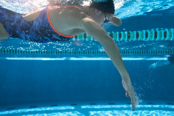 istock Adaptive Athlete training in the swimming pool. 1132096703