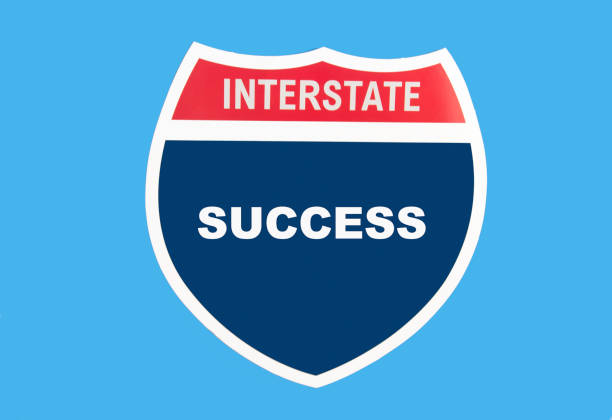 Highway placard with a concept that demostrates ambition .