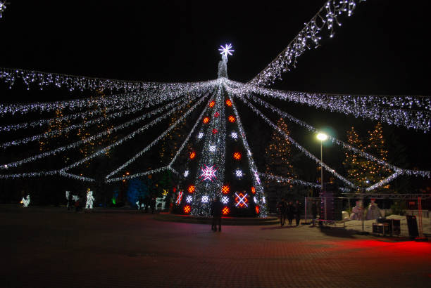 istock Christmas tree. Christmas decorations on the street at night. 1132101450