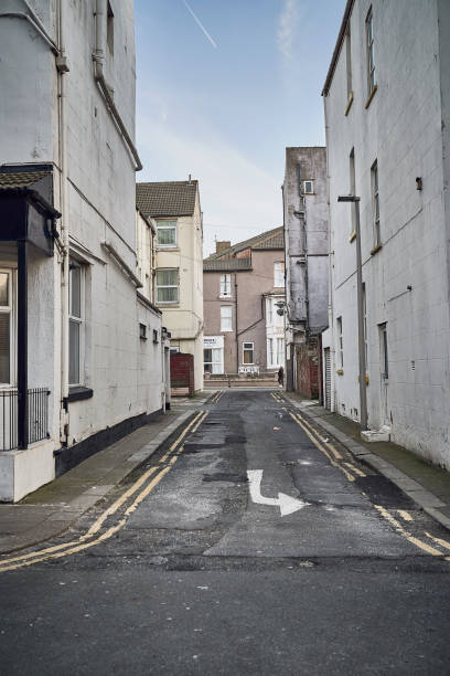 istock dirty alley in city 1132104663