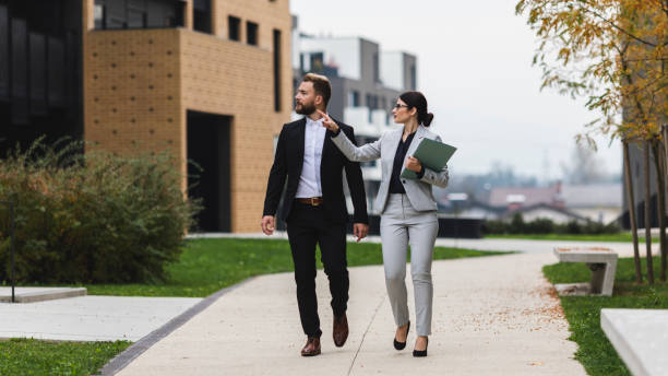 istock A female real estate agent showing properties 1132105157