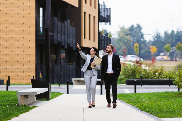 istock A female real estate agent showing properties 1132105421