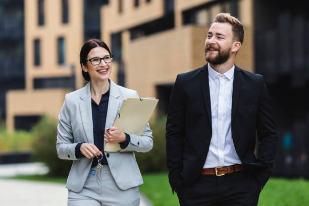 istock A female real estate agent with her client 1132105467