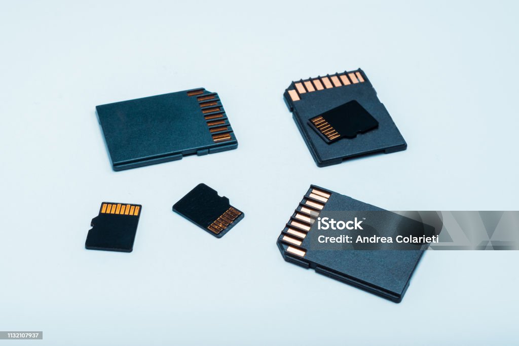 A group of normal and micro SD memory cards on a white background Memory Card Stock Photo