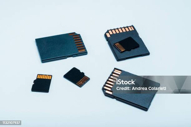 A Group Of Normal And Micro Sd Memory Cards On A White Background Stock Photo - Download Image Now