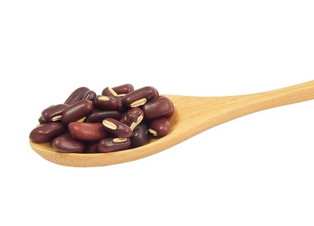 istock Kidney Beans in Wooden Spoon on White Background 1132110528