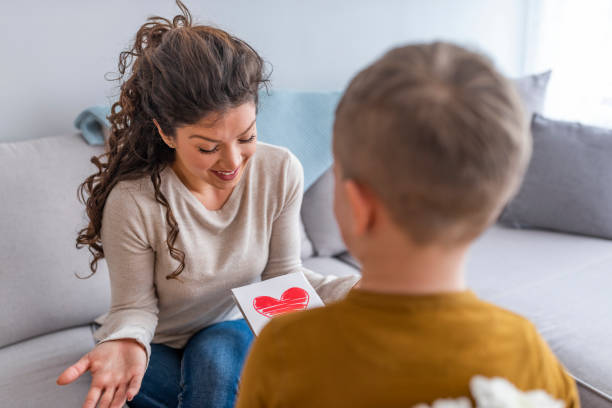 istock Mum and boy smiling and hugging 1132111910