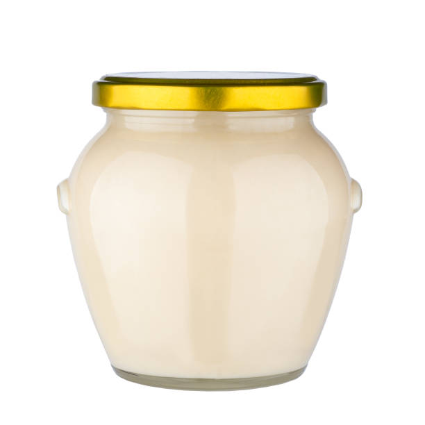 istock Glass honey jar isolated on white background. 1132114594