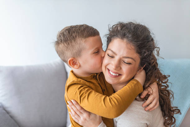 istock Son is kissing his mother. 1132115234