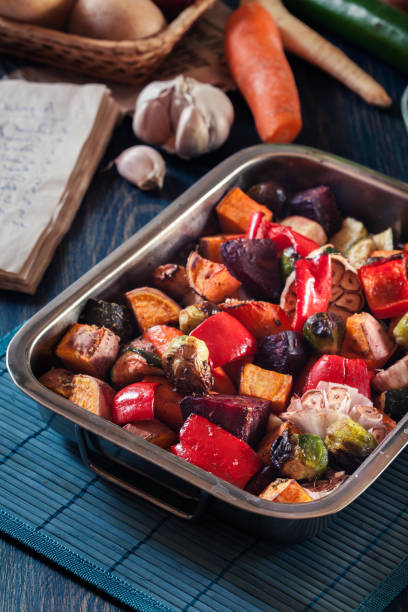 istock Roasted vegetables on baking metal tray 1132115877
