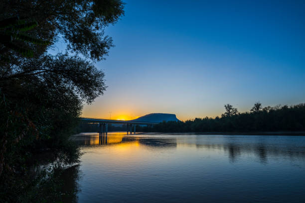 istock Morning sunrise on the river 1132116097