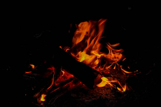 Logs of wood, burn bright red fire.  Flame of fire. Logs of wood, burn bright red fire.  Flame of fire. огонь stock pictures, royalty-free photos & images