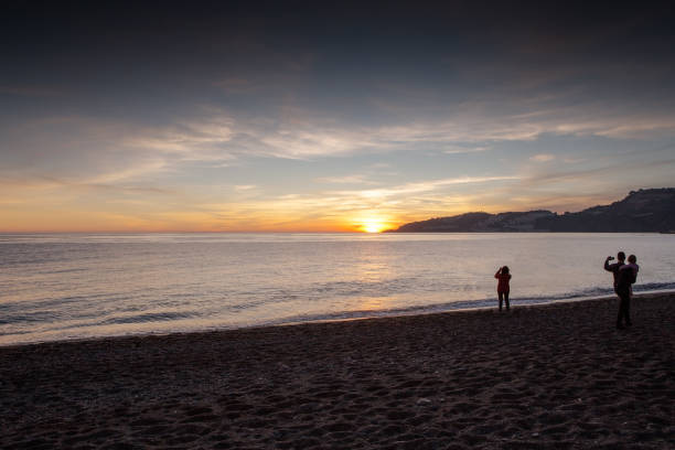 istock sunset on the beach in almunecar spain 1132119180