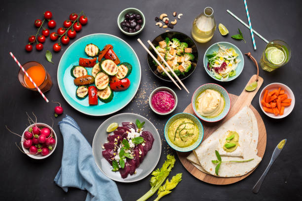 istock Colorful vegetarian feast dinner table from above 1132120500