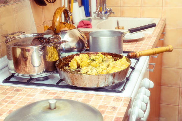 istock Fried potatoes with dill in a pan on gas stove 1132120507