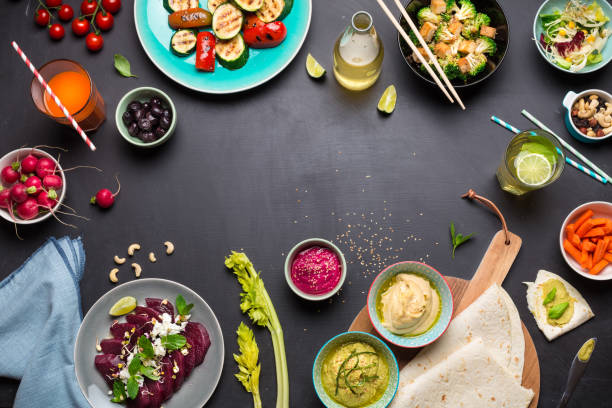 istock Colorful vegetarian feast dinner table from above 1132120530