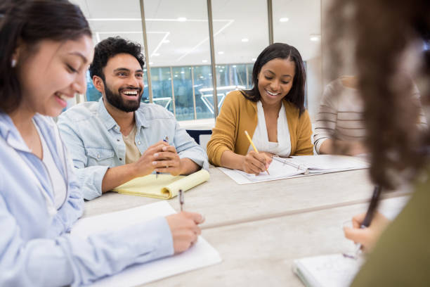 istock Group of college students enjoy lively study group 1132123691
