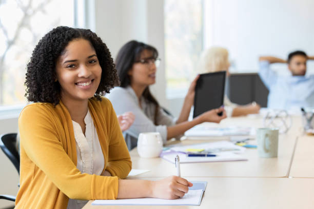istock Young female design professional smiles for camera 1132123953