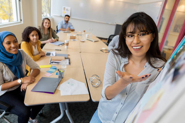 Design manager gives presentation to team
