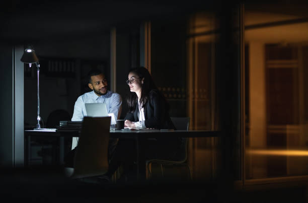 istock Business People Working Late in The Office 1132130106