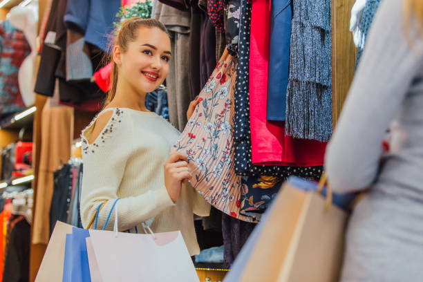 istock Young girls in the store bought things. 1132130302