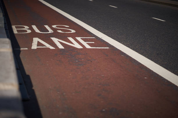 istock An empty red painted bus lane in central London. 1132132997