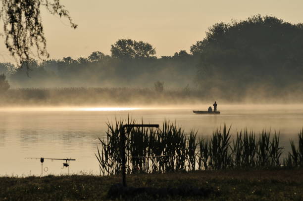 istock a fisherman in a boat 1132133049