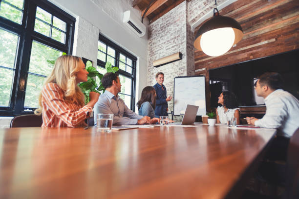istock Business people watching a presentation on the whiteboard. 1132135990