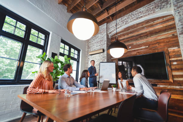 istock Business people watching a presentation on the whiteboard. 1132135991