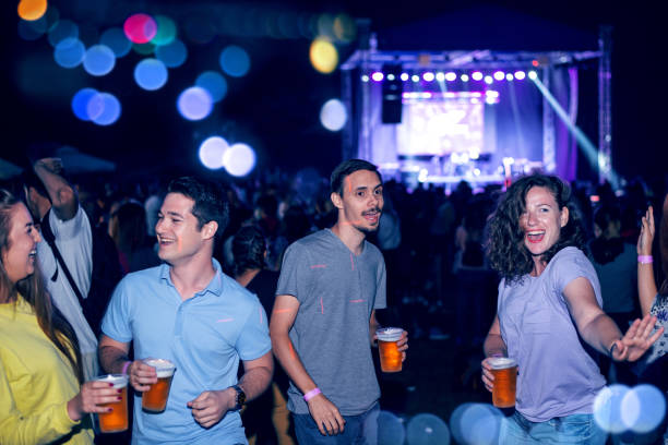 istock Friends enjoying a concert 1132138399