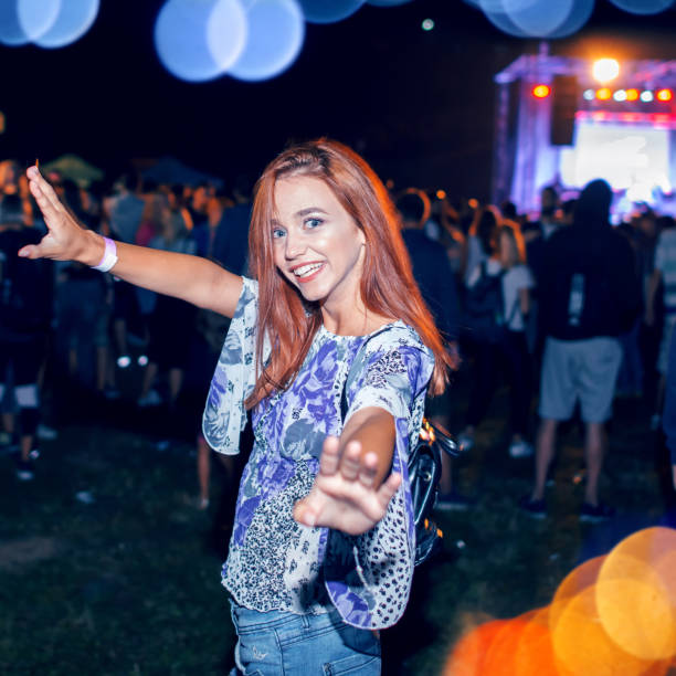 istock Woman dancing at a concert 1132138455