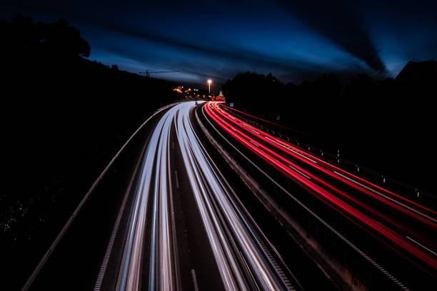 istock spectacular light trails on the highway in tenerife 1132140787