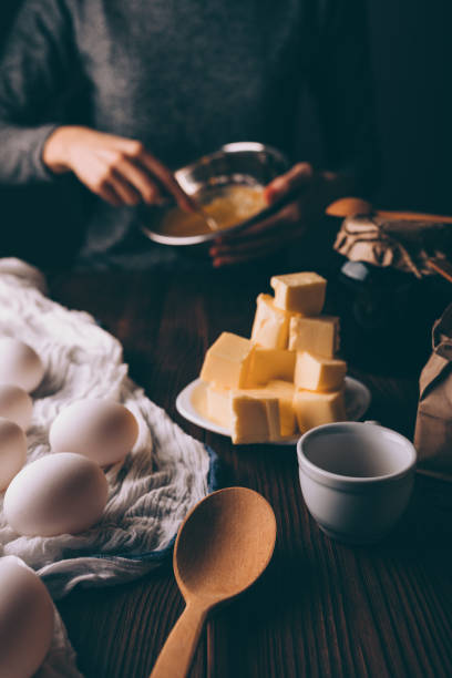 istock Woman mixing sugar and yolks 1132144547