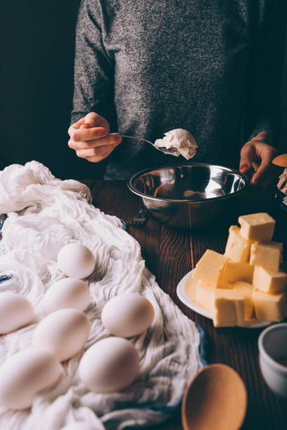 istock Cropped image young woman cooking dough for pie 1132144574