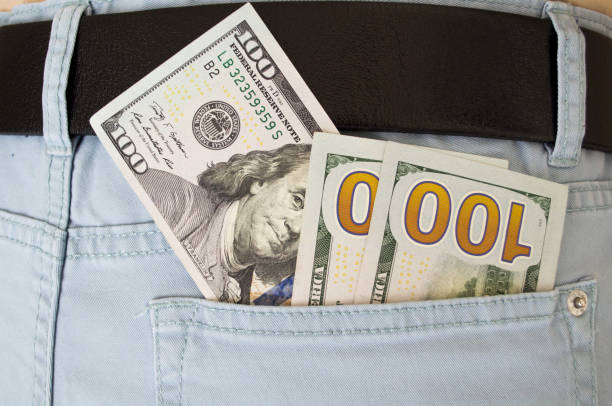 istock Hundred Dollar bill in jeans pocket 1132147341