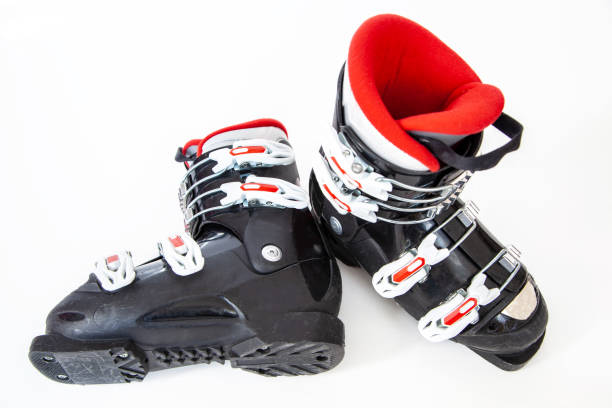istock Pair of Red and Black Ski Boots Isolated on White Background 1132147580