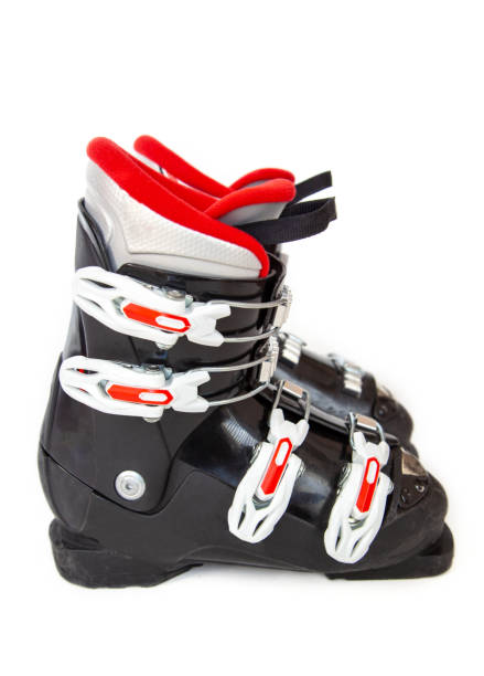 istock Pair of Red and Black Ski Boots Isolated on White Background 1132147584
