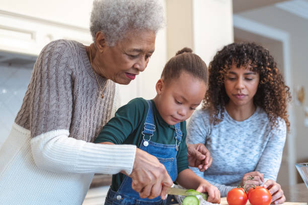 istock Family generations cooking together 1132153005
