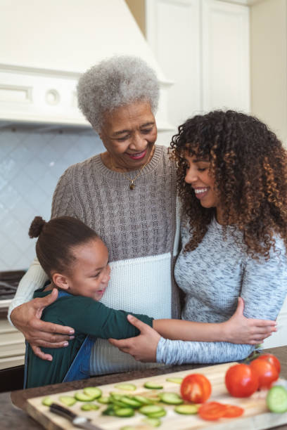 istock Family generations cooking together 1132153012