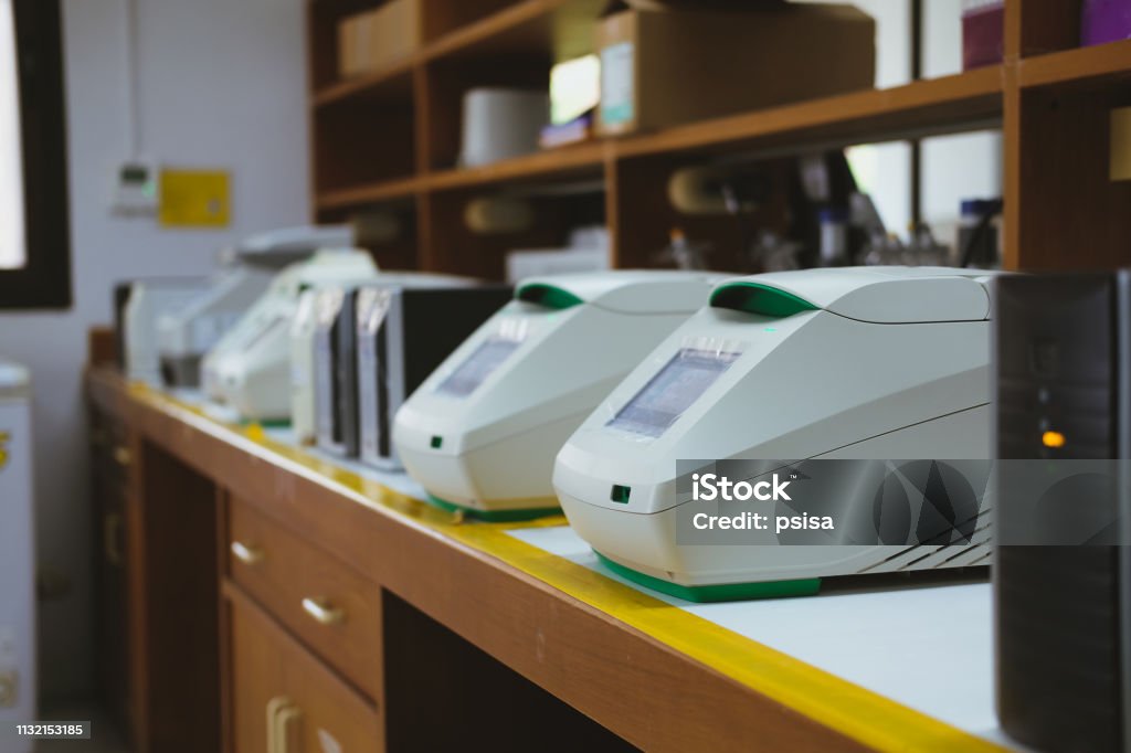 DNA copying in real time PCR thermal cycler DNA copying in real time PCR thermal cycler in lab DNA Stock Photo