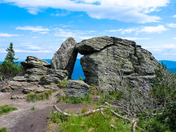 istock Stone window in Jeseniky mountains in summer. 1132153211