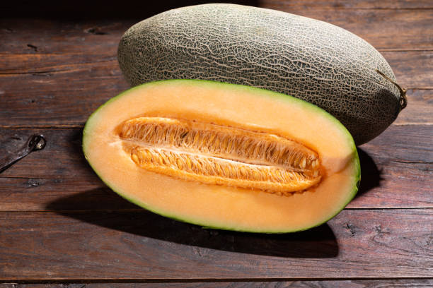 istock Hami melon on wooden table 1132162734