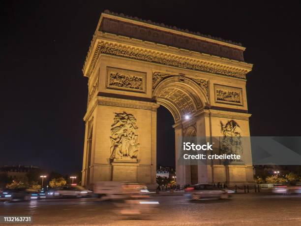 An Oblique View Of The Arc De Triomphe De Letoile Stock Photo - Download Image Now - Night, Paris - France, Arc de Triomphe - Paris
