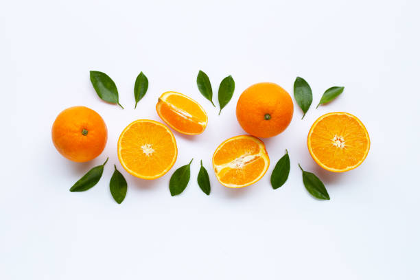 istock High vitamin C. Fresh orange citrus fruit with leaves isolated on white . 1132164628