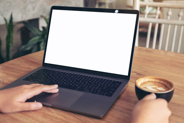 istock woman's hands typing and touching on laptop touchpad with blank white desktop screen 1132167267
