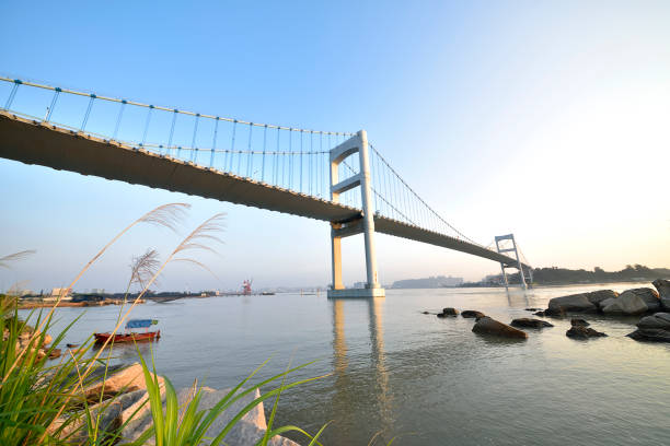 istock Urban traffic bridge on the water 1132167393