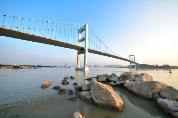 istock Urban traffic bridge on the water 1132168125