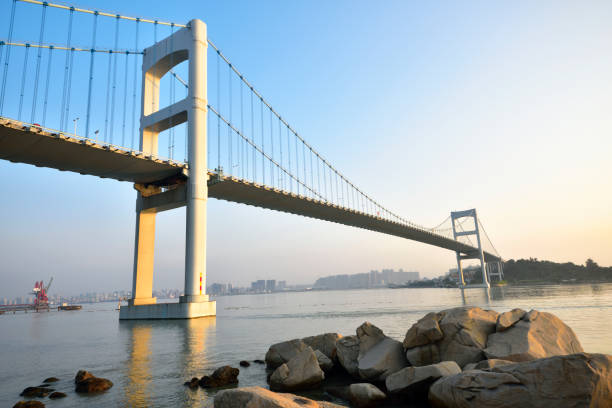 istock Urban traffic bridge on the water 1132168200
